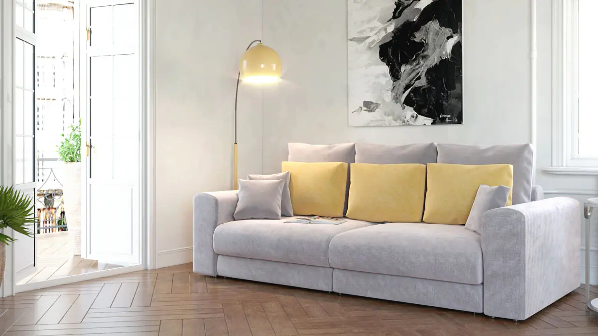 Kam umístit pohovku, aby se obývací pokoj „otevřel“, podle dekoratérů